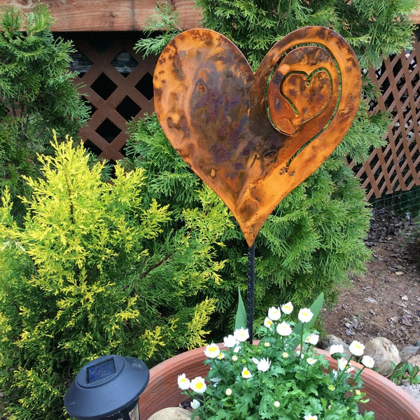 A Rusted Heart Stake in the Garden